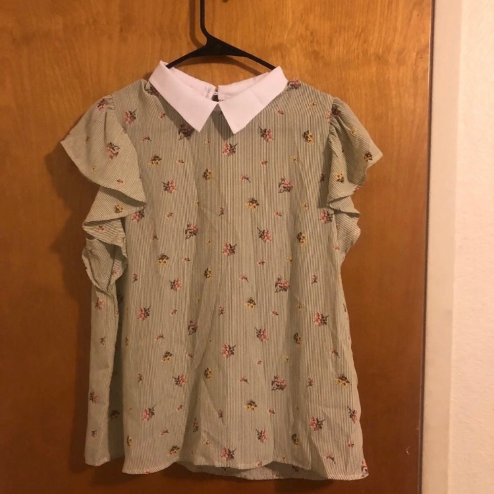 A cute Peter Pan collar blouse